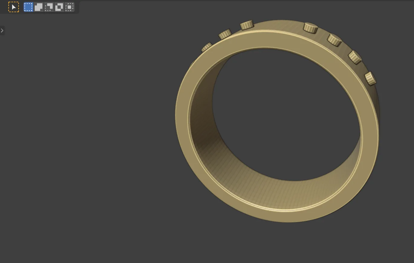 A wide flat band with a row of small round studs on each side of the top, seen from the front and slightly above